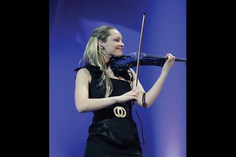In keeping with the classical theme, an electric violinist serenaded winners as they made their way to the stage